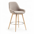 Upholstered counter height bar stool with wooden legs and metal footrest